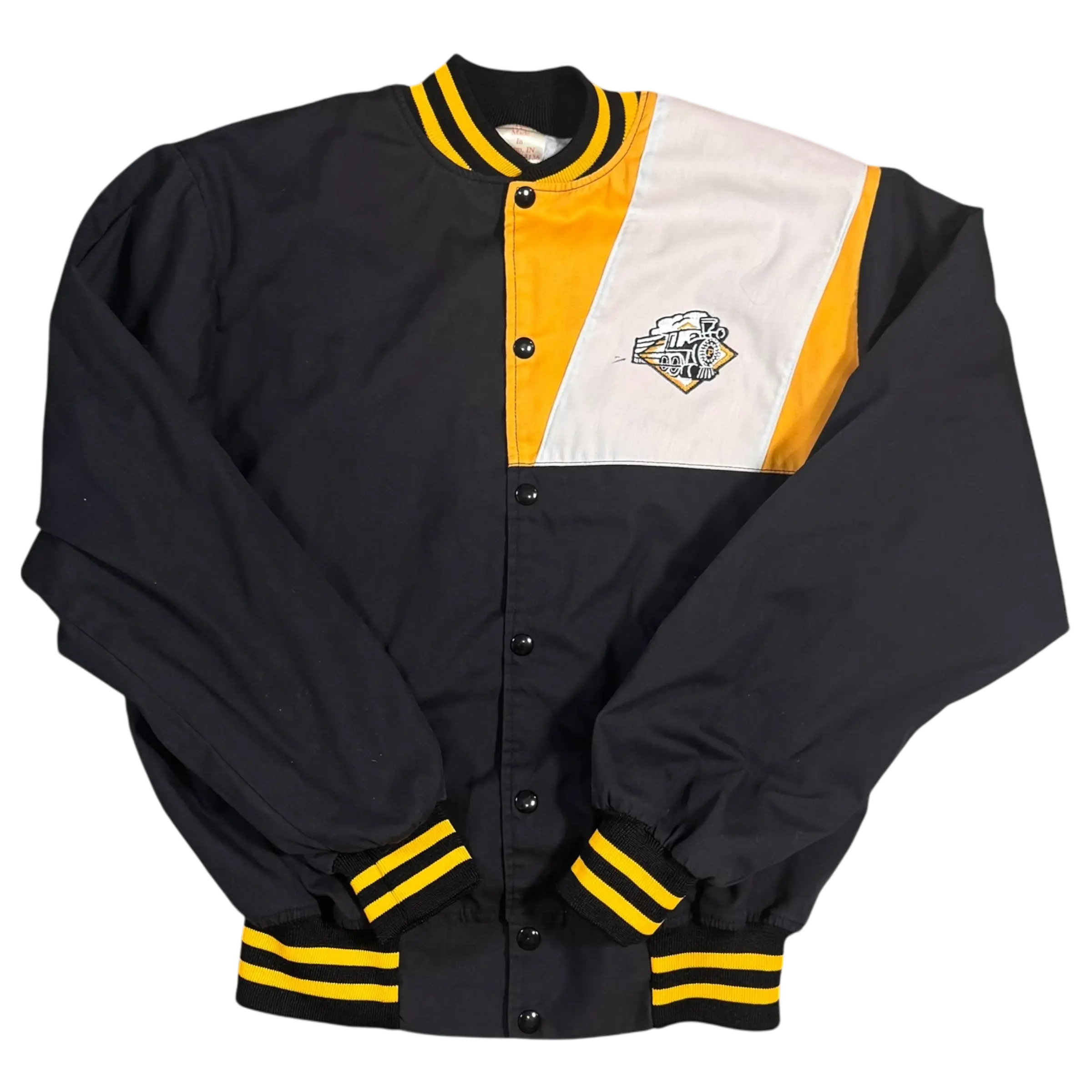 Black and yellow tri-color jacket by Chalk Line with a Purdue design and small black mark by the embroidered train.